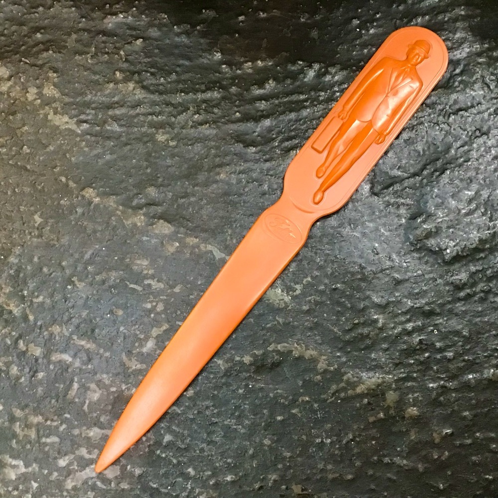 Fuller Brush Man Woman Suit Letter Opener Plastic Orange Made in U.S.A. Vintage